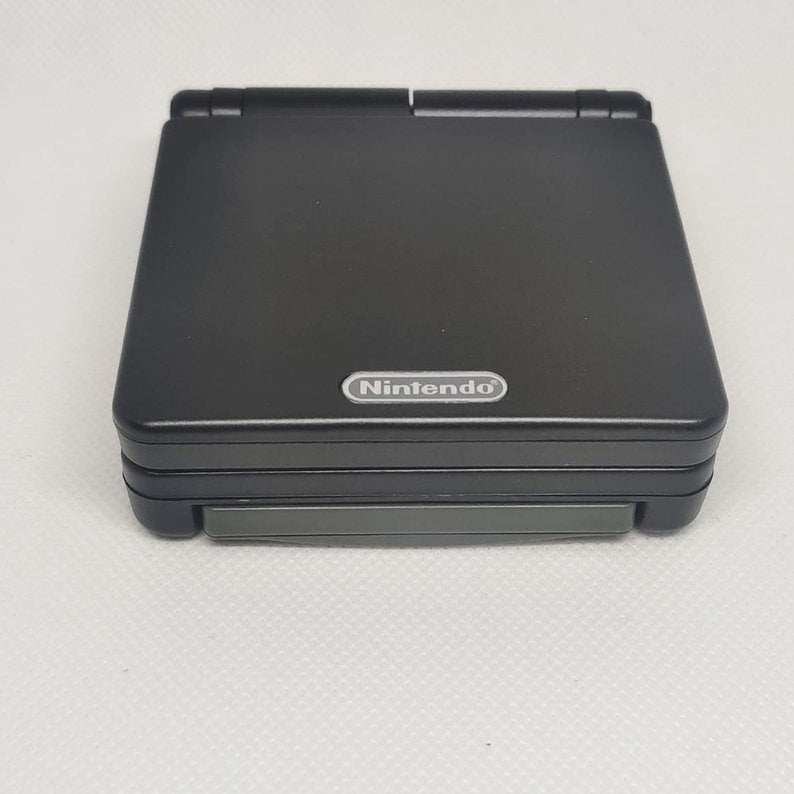 Black Nintendo Game Boy Advance SP GBA SP Console Refurbished GameBoy Advance Original AGS-001 Front-Lit Screen, Larger 900mAh Battery. Boxed new condition & Charger.