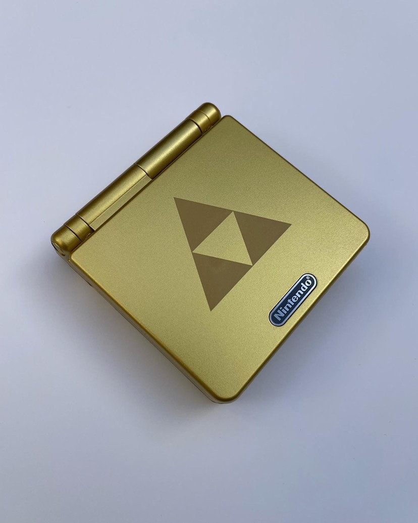 Zelda Gold Triforce Nintendo Game Boy Advance SP GBA SP Console Refurbished GameBoy Advance Original Front-Lit AGS-001 Screen, Larger 900mAh Battery. Boxed & Charger.