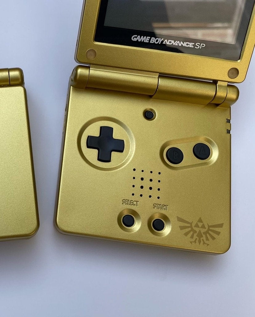 Zelda Gold Triforce Nintendo Game Boy Advance SP GBA SP Console Refurbished GameBoy Advance Original Front-Lit AGS-001 Screen, Larger 900mAh Battery. Boxed & Charger.